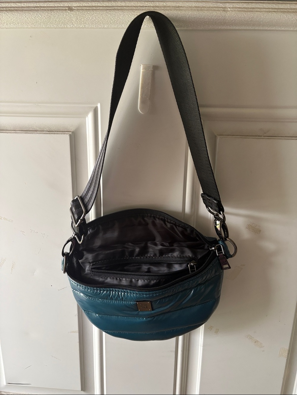 THINK ROYLN Teal Quilted Crossbody Bag with Black Strap